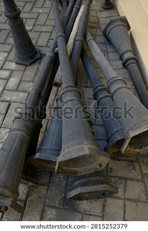 Black patterned iron pillars on the streets usually
