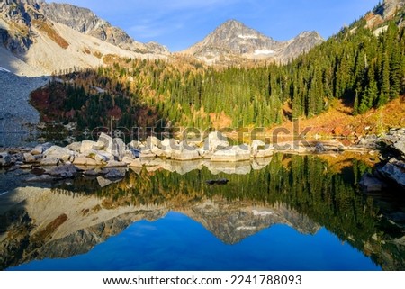 Black Peak and Fall Colors Reflected in Wing Lake.
North Cascades Washington.