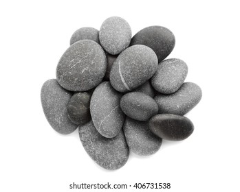 Black pebbles on white background