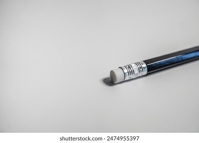 black pencil with rubber close up on white background - eraser empty paper - Powered by Shutterstock