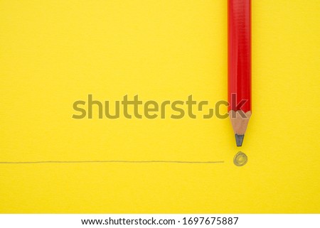 Black pencil write the end point dot on yellow paper background with copy space. Concept of conclusion, completion and successful in business target, KPI, goal. 