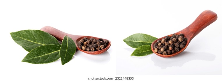 Black pepper and bay leaves isolated on a white background. 