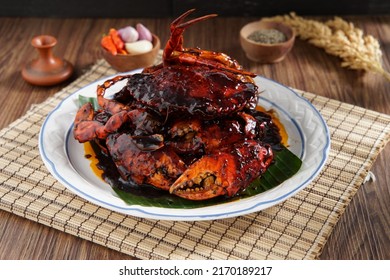 Black Pepper Crab With Props For Menu Book Photo