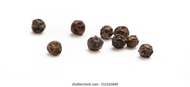Black pepper isolated on white background. Spices. - Shutterstock ID 512161840