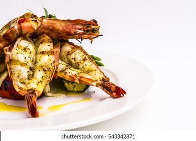 Black Pepper Tiger Prawns On A White Plate