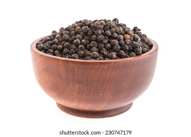 Black Pepper In Wooden Bowl Isolated On White Background