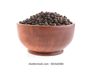 Black Pepper In Wooden Bowl Isolated On White Background