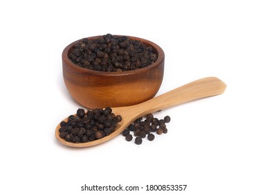 Black Pepper In Wooden Bowl And Spoon On White Background