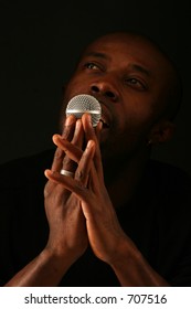 black person and microphone
