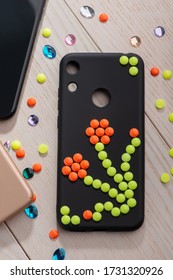 Black Phone Case With Colorful Bead Flower. Beautiful Decoration Made By Hand. Kids DIY Project.