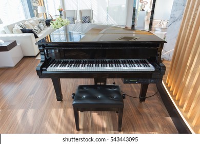 A Black Piano In A Modern Living Room