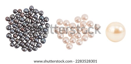 Black ,pink and cream pearls isolated on white with clipping path.top view.