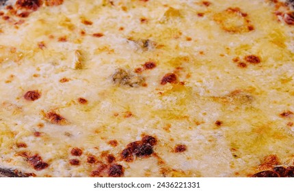 black pizza with cheese close up - Powered by Shutterstock