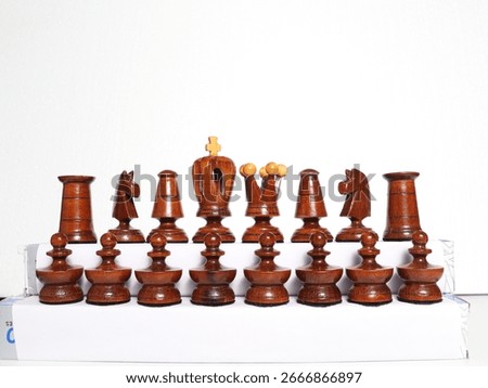 Black chessmen’s in a plain background 