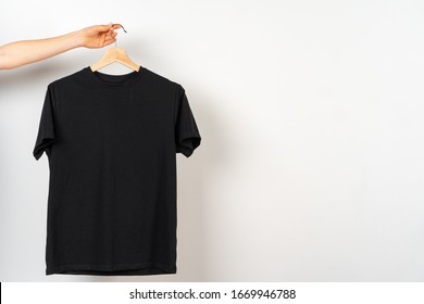 plain black t shirt on hanger