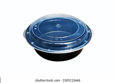 Black Plastic Bowl And Clear Lid On A White Background.