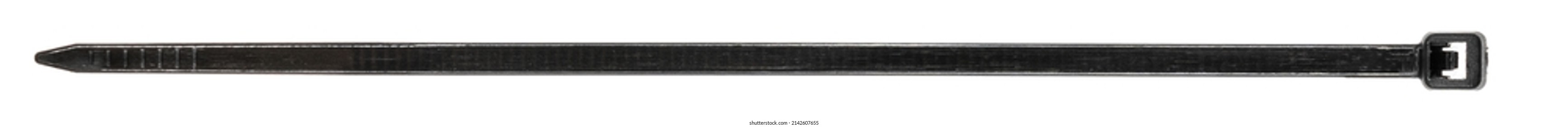 Black Plastic Cable Ties Isolated On White Background. Plastic Wire Ties Closeup.