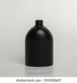 Black Plastic Container, For Antiseptic, Cleaning Products. Bottle On A White Background, Close-up.Packaging For Cosmetics, Gel, Shampoo With A Lid.