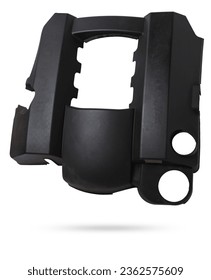 Black plastic engine cover on a white background in a photo studio as a separate spare part for sale at an auto-parsing or for replacement when repairing a car in the service.