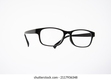 Black Plastic Frame Eyeglasses. Close Up Studio Shot, Isolated On White Background, No People.