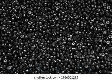 Black Plastic, Polymer Pellets For The Production Of Plastic Products. Close-up