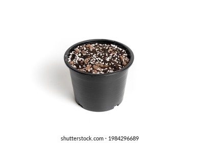 Black Plastic Pot With Porous Soil Mixture In Isolated White Background. 