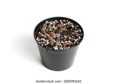 Black Plastic Pot With Porous Soil Mixture In Isolated White Background. 