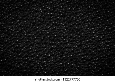 Black plastic texture background - macro photography