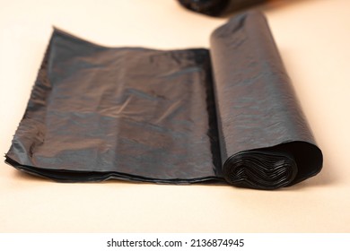 Black Plastic Trash Bag Close-up.