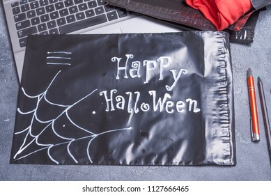 Black polythene envelope, Happy Halloween concept - Powered by Shutterstock