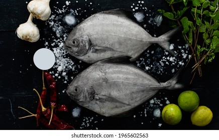 Black Pomfret Fish, Food Photography With Black Pomfret And Lemons