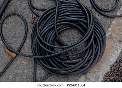 Black Power Cord Coils On The Floor