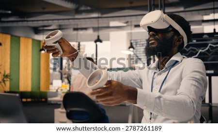 Black professional using VR glasses in corporate office environment, high-tech virtual reality applications display charts and performance metrics, combining metaverse simulation and data analysis.