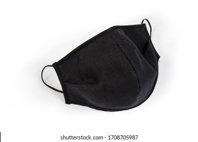 Black Protective Fabric Face Mask With Rubber Bands On A White Background
