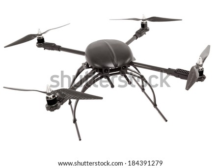 Black quadrocopter at studio