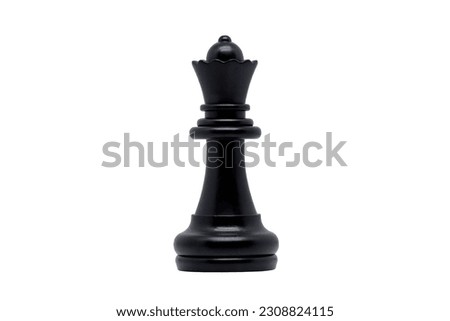 Black queen chess piece with selective focus isolated on white