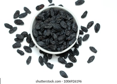 Black Raisins On White Background