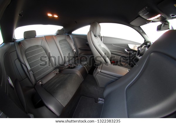 black rear seat in the\
passenger car