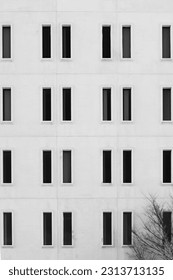 black rectangle windows on white building