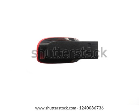 Black and red color small USB flash pen drive on white background