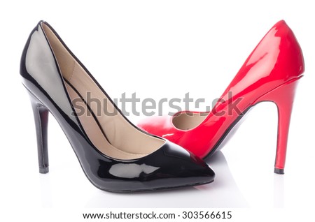 Black and red high heel shoe, isolated on white