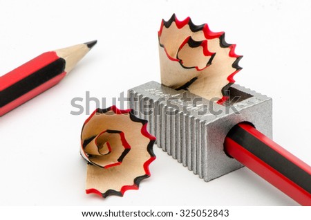 Black and red lead pencil with sharpner on white background