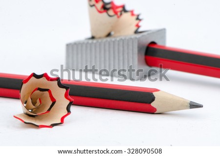 Black and red lead pencil with sharpner on white background