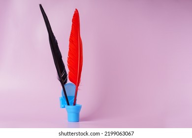 Black And Red Pens For Writing In A Small Toilet Bowl Instead Of An Inkwell. The Concept Of Writing Lowbrow Literature