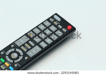 Black remote control for changing television channels