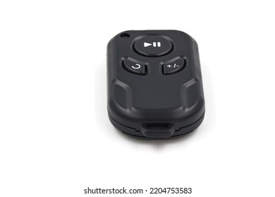 Black Remote Control On White Background. Wireless Remote Control Concept.