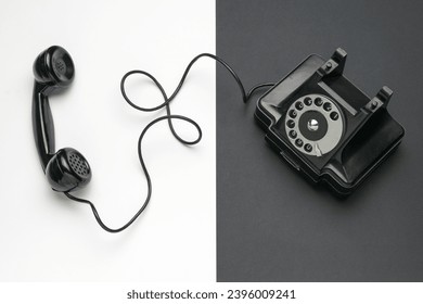 A black retro phone on a black and white background. Stained glass technique. - Shutterstock ID 2396009241