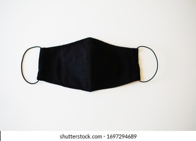 Black Reusable Cloth Face Mask  Isolated On White Background.