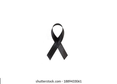 A Black Ribbon On A White Background With Copy Space