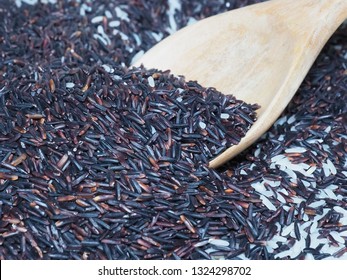 Black Rice In Wooden Tray And Ladel